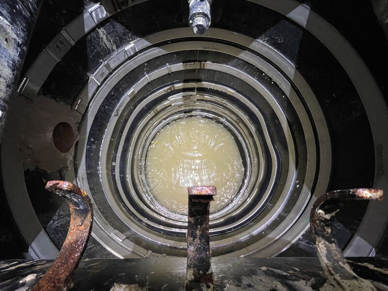 Completed underground sump tank repair with internal stainless steel support rings