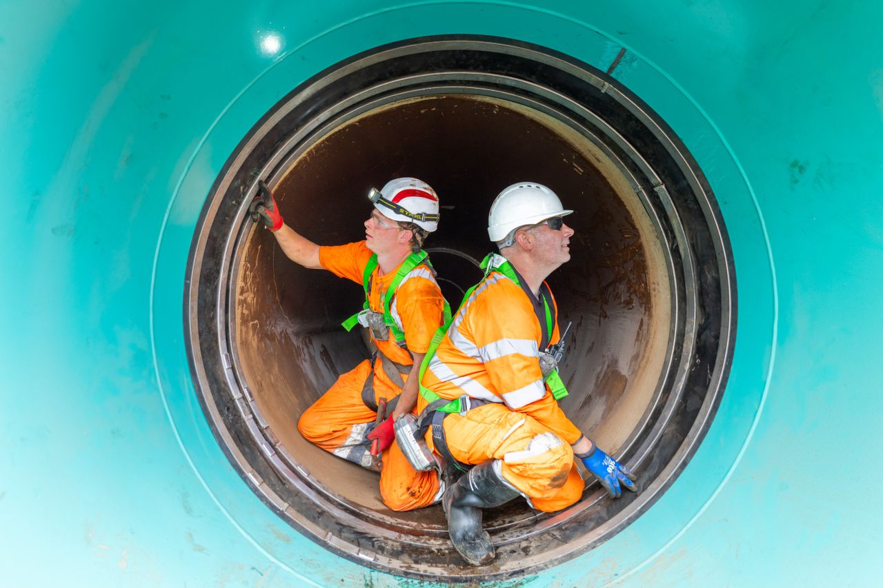Installers inspecting a VIP-WECO internal pipe seal inside the Ballymore Eustace to Saggart trunk watermain