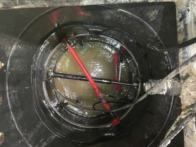 Internal repair work in progress inside the underground sump tank